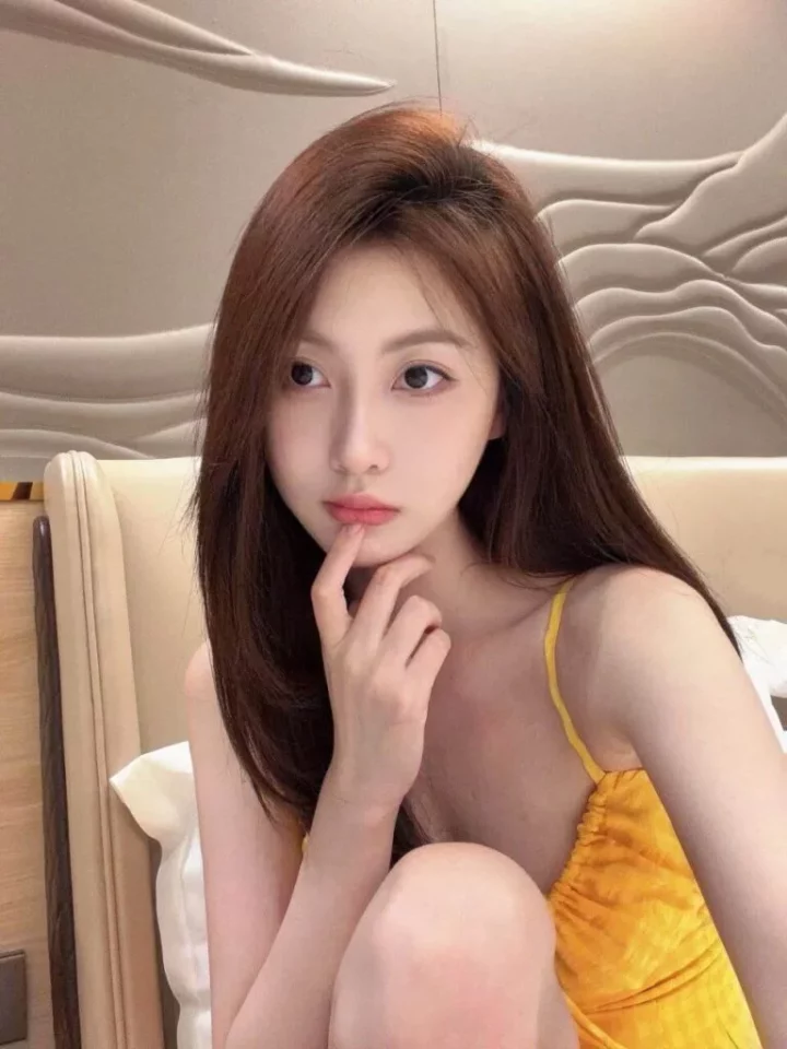 escort in Singapore companion Enny Hindi — sophisticated presentation for private time in Singapore